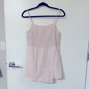 Urban Outfitters pink checkered smocked skort romper